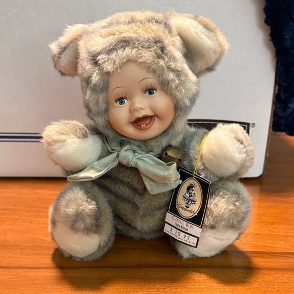 Vintage Geppeddo Cuddle Plush Porcelain Baby Doll with Bow “Casey Kitten”
